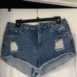 Distressed denim shorts